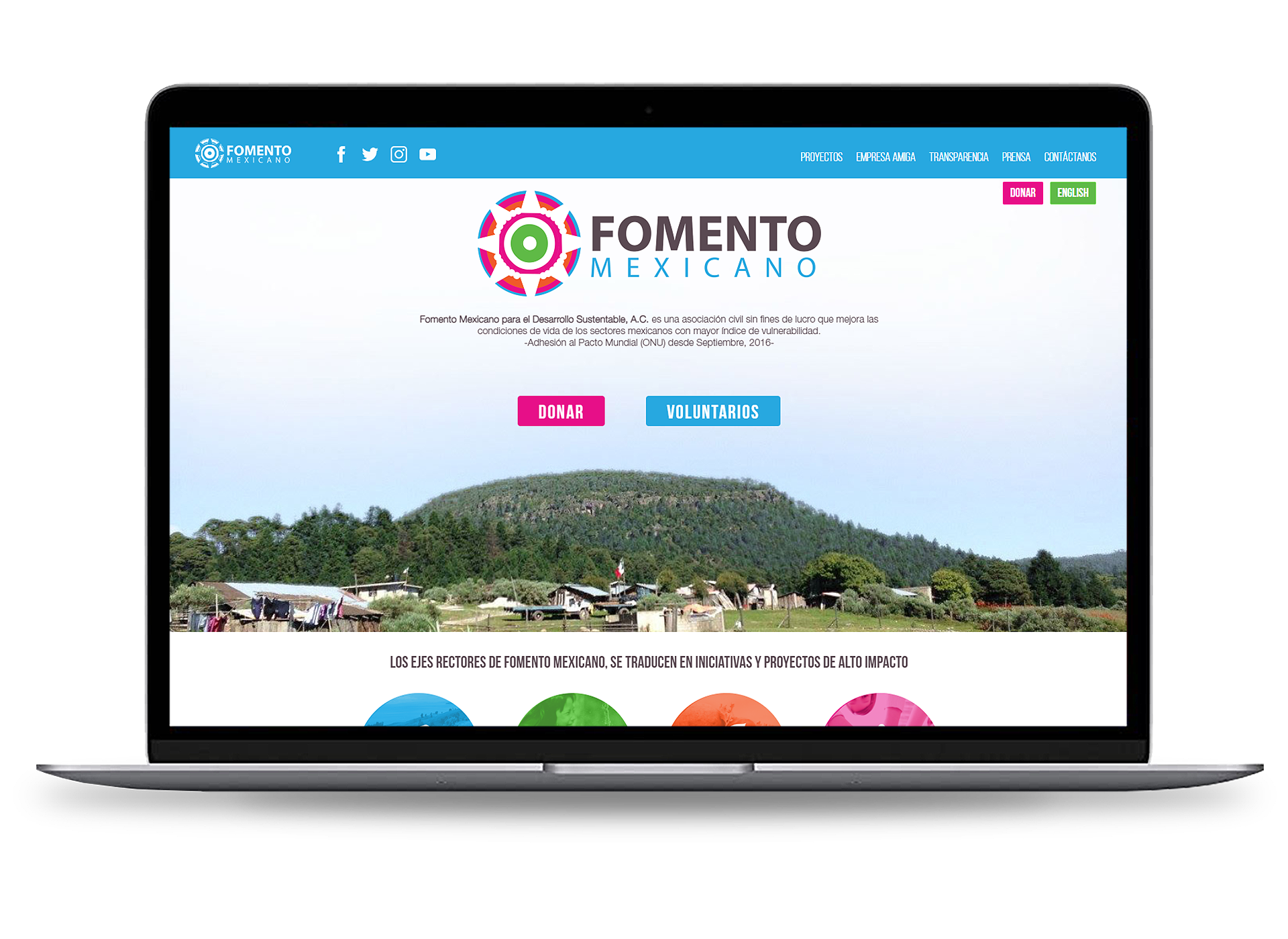 Laptop showcasing the website 'Fomento Mexicano'